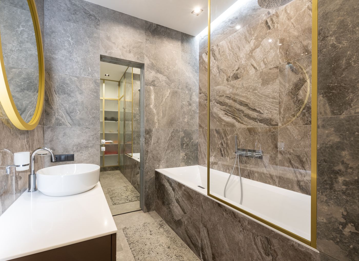 Vanity with basin and round mirror